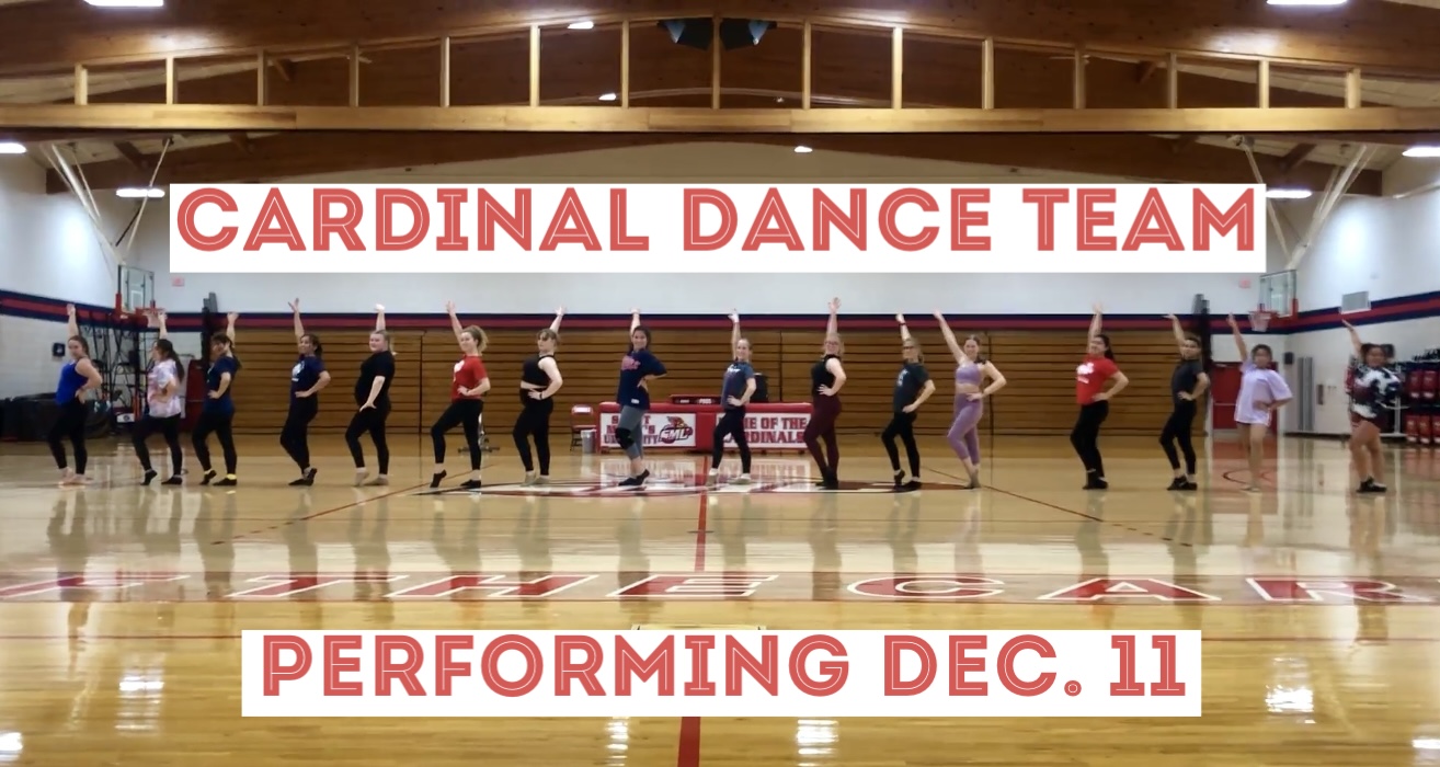 Dance team in a straight line on the basketball court