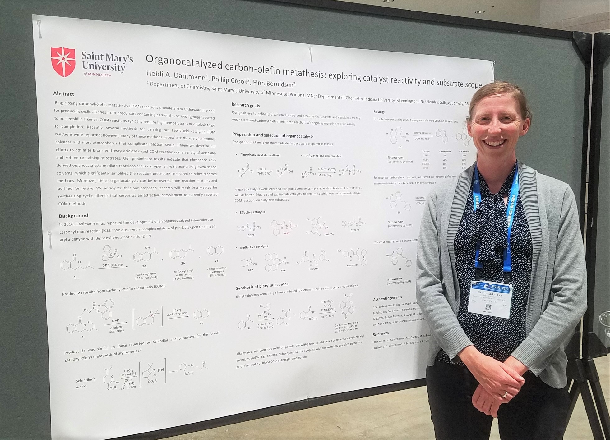 Dr. Dahlmann in front of poster.