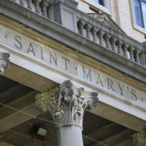 A picture of the exterior of Saint Mary's Hall main entrance columns and signage "Saint Mary's"