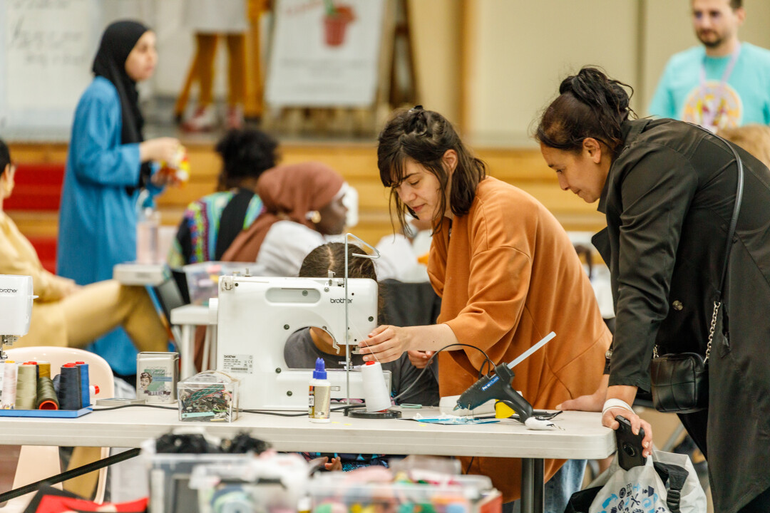 Volunteers and visitors at a repair event