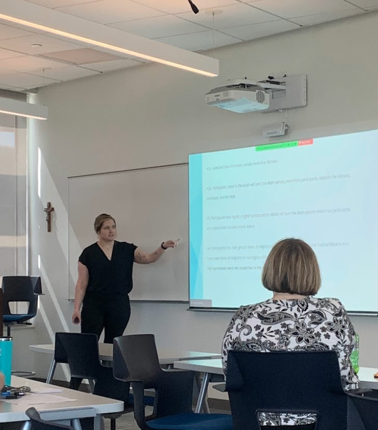Image of student giving a presentation