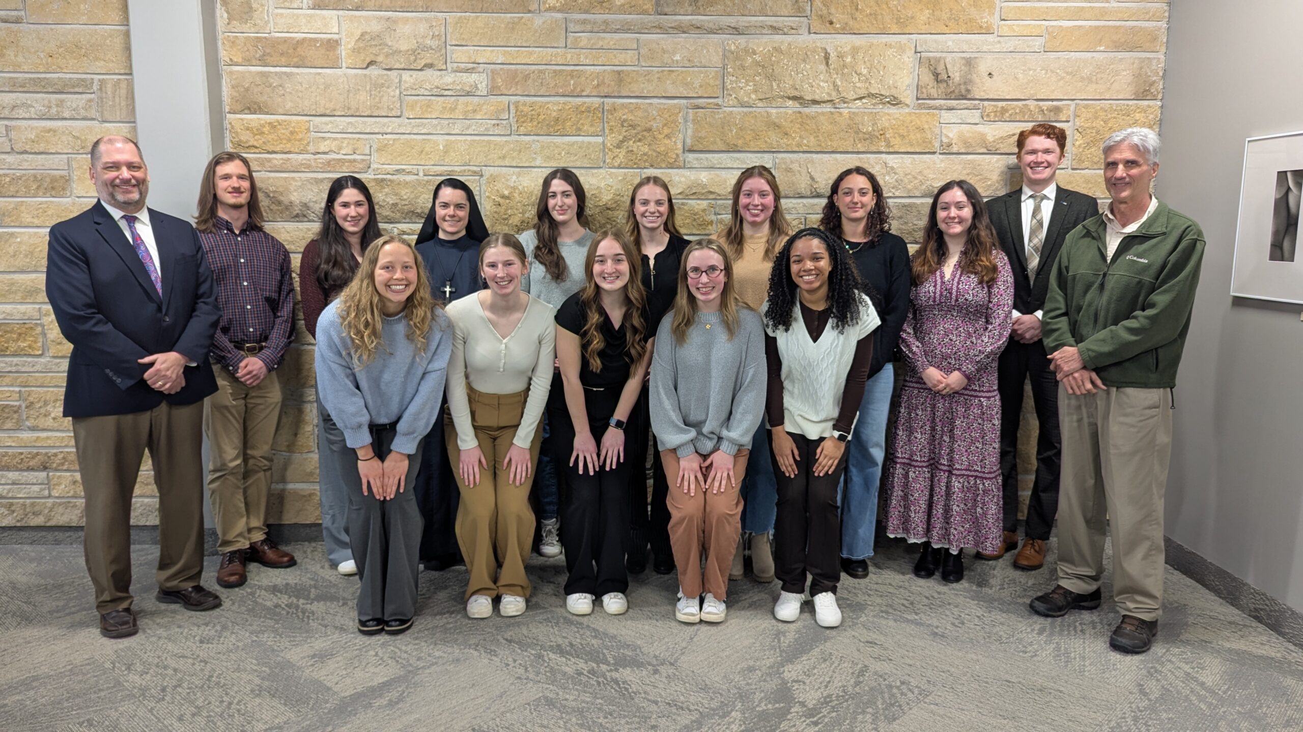 New Members of the Delta Epsilon Sigma honor society with Dr. Darren Row and Dr. Kevin Rickert